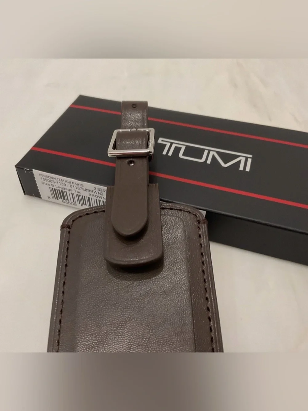 NEW IN BOX - Tumi 3.625” x 2.25” Leather Luggage Name Tag w/ Buckle - BROWN